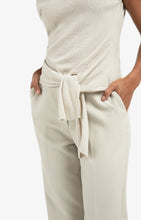 Load image into Gallery viewer, Sleeveless Sweater with knot detail and shimmer - Cream