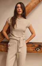 Load image into Gallery viewer, Sleeveless Sweater with knot detail and shimmer - Cream
